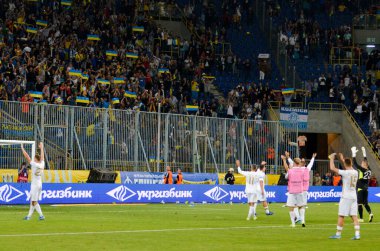 DNIPRO, UKRAINE - September 10, 2019: Ukraine national team players celebrate with fans and thank them for their support during the friendly match between Ukraine against Nigeria, Ukraine