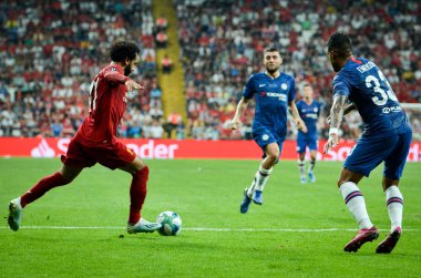 Istanbul, Turkey - August 14, 2019: Mohamed Salah and Emerson player during the UEFA Super Cup Finals match between Liverpool and Chelsea at Vodafone Park in Vodafone Arena, Turkey