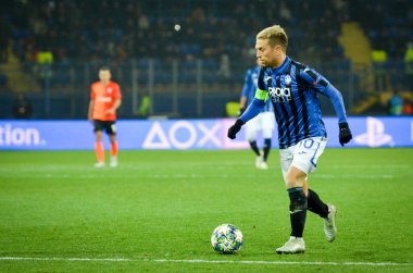 KHARKIV, UKRAINE - December 11, 2019: Papu Gomez player during the UEFA Champions League match between Shakhtar vs Atalanta Bergamasca Calcio BC (Italy), Ukraine