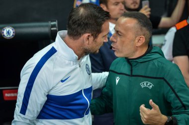 Istanbul, Turkey - August 14, 2019: Coach Frank Lampard with referee during the UEFA Super Cup Finals match between Liverpool and Chelsea at Vodafone Park in Vodafone Arena, Turkey