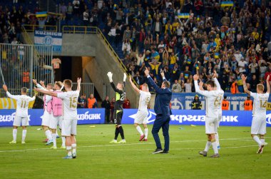 DNIPRO, UKRAINE - September 10, 2019: Ukraine national team players celebrate with fans and thank them for their support during the friendly match between Ukraine against Nigeria, Ukraine