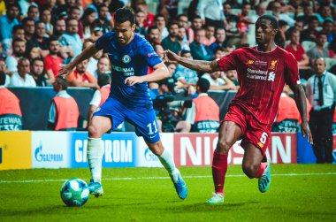 Istanbul, Turkey - August 14, 2019: Pedro and Georginio Wijnaldum during the UEFA Super Cup Finals match between Liverpool and Chelsea at Vodafone Park in Vodafone Arena, Turkey