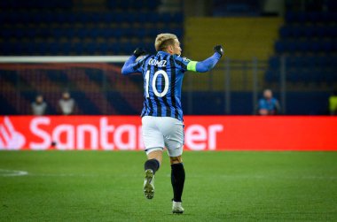 KHARKIV, UKRAINE - December 11, 2019: Papu Gomez celebrate goal scored during the UEFA Champions League match between Shakhtar vs Atalanta Calcio BC (Italy), Ukraine