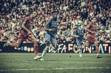 Istanbul, Turkey - August 14, 2019: Joel Matip and Tammy Abraham during the UEFA Super Cup Finals match between Liverpool and Chelsea at Vodafone Park in Vodafone Arena, Turkey