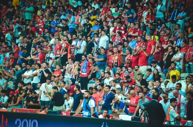 Istanbul, Turkey - August 14, 2019: Liverpool Football fans and spectators during the UEFA Super Cup Finals match between Liverpool and Chelsea at Vodafone Park in Vodafon Arena, Turkey