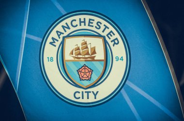 KHARKIV, UKRAINE - September 18, 2019: Manchester City official logo and emblem closeup during the UEFA Champions League match, Ukraine