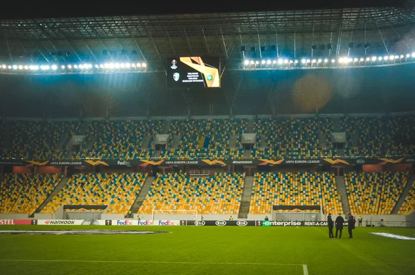 LVIV, UKRAINE - November 07, 2019: Night football stadium with light close up and general view during the UEFA Europa League match between Alexandria vs AS Saint Etienne (France), Ukraine