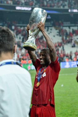 Istanbul, Turkey - August 14, 2019: Georginio Wijnaldum with trophy UEFA Super Cup Finals  at Vodafone Park in Vodafone Arena, Turkey
