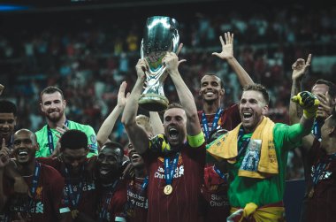 Istanbul, Turkey - August 14, 2019: Liverpool footballers celebrate victory at award ceremony during the UEFA Super Cup Finals match between Liverpool and Chelsea at Vodafone Park, Turkey