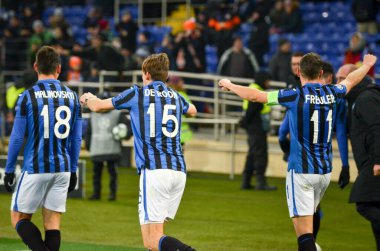 KHARKIV, UKRAINE - December 11, 2019:  Marten de Roon and Remo Freuler during the UEFA Champions League match between Shakhtar vs Atalanta Calcio BC (Italy), Ukraine