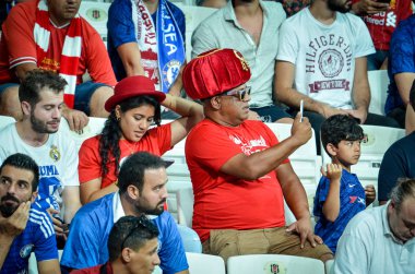 Istanbul, Turkey - August 14, 2019: Liverpool Football fans and spectators during the UEFA Super Cup Finals match between Liverpool and Chelsea at Vodafone Park in Vodafon Arena, Turkey
