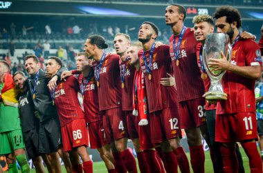 Istanbul, Turkey - August 14, 2019: Mohamed Salah celebrate victory with Liverpool  team and holdind trophy the UEFA Super Cup in Vodafone Arena, Turkey