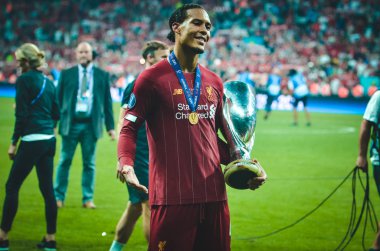 Istanbul, Turkey - August 14, 2019: Virgil van Dijk celebrate with UEFA Super Cup 2019 at Vodafone Park in Vodafone Arena, Turkey