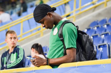 DNIPRO, UKRAINE - September 10, 2019: Nigeria supporter and spectators during the friendly match between national team Ukraine against Nigeria national team, Ukraine