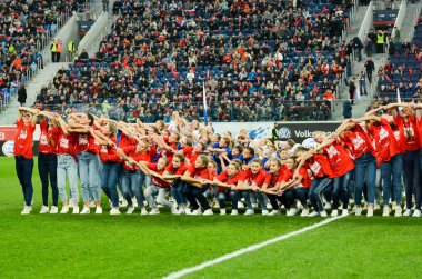 SAINT-PETERSBURG, RUSSIA - November 16, 2019: Performance before the match in the face of the girls with the inscription 