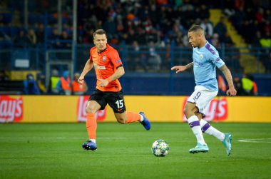 KHARKIV, UKRAINE - September 18, 2019: Gabriel Jesus and Yevgen Konoplyanka during the UEFA Champions League match between Shakhtar vs Manchester City, Ukraine