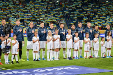 DNIPRO, UKRAINE - September 10, 2019: Ukraine national team during the anthem and friendly match between national team Ukraine against Nigeria national team, Ukraine
