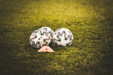 SAINT-PETERSBURG, RUSSIA - November 16, 2019: Three soccer balls close up lie on the lawn during UEFA EURO 2020 qualifying match between national team Russia against Belgium, Russia