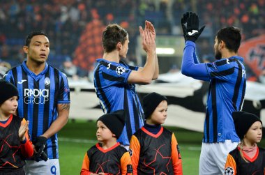 KHARKIV, UKRAINE - December 11, 2019: Atalanta BC player thanks fans for their support during the UEFA Champions League match between Shakhtar vs Atalanta BC (Italy), Ukraine