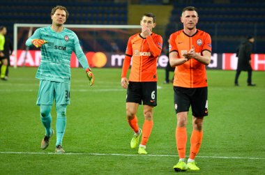 KHARKIV, UKRAINE - December 11, 2019: Shakhtar  player thanks their fans for suppport  during the UEFA Champions League match between Shakhtar vs Atalanta Bergamasca Calcio BC (Italy), Ukraine