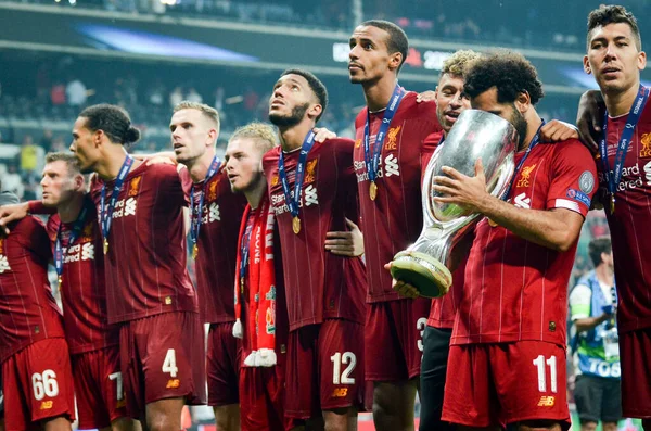 Istanbul, Turkey - August 14, 2019: Mohamed Salah celebrate victory with Liverpool  team and holdind trophy the UEFA Super Cup in Vodafone Arena, Turkey