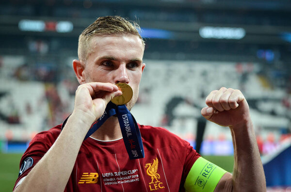 Istanbul, Turkey - August 14, 2019: Jordan Henderson kiss his gold medal during the UEFA Super Cup Finals match between Liverpool and Chelsea at Vodafone Park in Vodafone Arena, Turkey