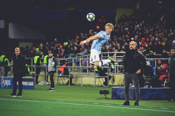 KHARKIV, UKRAINE - September 18, 2019: Oleksandr Zinchenko and Pep Guardiola during the UEFA Champions League match between Shakhtar vs Manchester City, Ukraine