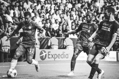 Istanbul, Turkey - August 14, 2019: Pedro and Georginio Wijnaldum during the UEFA Super Cup Finals match between Liverpool and Chelsea at Vodafone Park in Vodafone Arena, Turkey