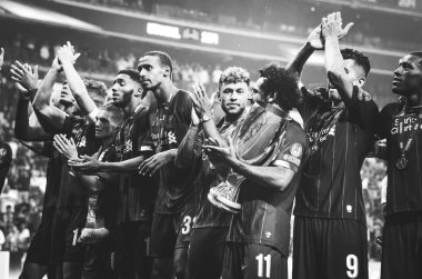 Istanbul, Turkey - August 14, 2019: Mohamed Salah celebrate victory with Liverpool  team and holdind trophy the UEFA Super Cup in Vodafone Arena, Turkey