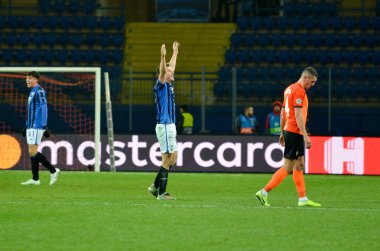 KHARKIV, UKRAINE - December 11, 2019: Atalanta player celebrate their team getting to the next round of the 1/8 finals Champions League, Ukraine