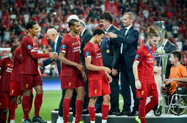 Istanbul, Turkey - August 14, 2019: Liverpool football players get gold medals during the UEFA Super Cup Finals match between Liverpool and Chelsea at Vodafone Park, Turkey
