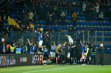 KHARKIV, UKRAINE - December 11, 2019: Atalanta player celebrate their team getting to the next round of the 1/8 finals Champions League, Ukraine