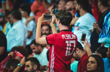 Istanbul, Turkey - August 14, 2019: Liverpool Football fans and spectators during the UEFA Super Cup Finals match between Liverpool and Chelsea at Vodafone Park in Vodafon Arena, Turkey