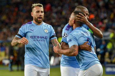 KHARKIV, UKRAINE - September 18, 2019: Nicolas Otamendi and Gabriel Jesus celebrate goal scored during the UEFA Champions League match between Shakhtar vs Manchester City (England), Ukraine