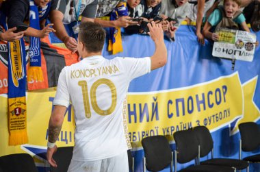 DNIPRO, UKRAINE - September 10, 2019: Yevhen Konoplyanka with fans during the friendly match between national team Ukraine against Nigeria national team, Ukraine