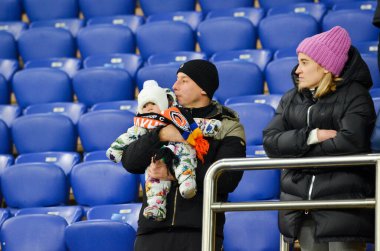 KHARKIV, UKRAINE - December 11, 2019: Football fans and spectators during the UEFA Champions League match between Shakhtar vs Atalanta BC (Italy), Ukraine
