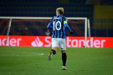 KHARKIV, UKRAINE - December 11, 2019: Papu Gomez celebrate goal scored during the UEFA Champions League match between Shakhtar vs Atalanta Calcio BC (Italy), Ukraine
