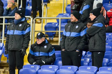 KHARKIV, UKRAINE - December 11, 2019: Youth Atalanta Football Players as spectators on the stadium, Ukraine