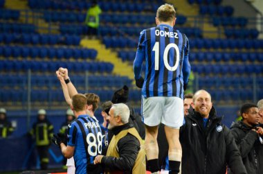 KHARKIV, UKRAINE - December 11, 2019: Papu Gomez celebrate victory with fans to the next round  UEFA Champions League, Ukraine