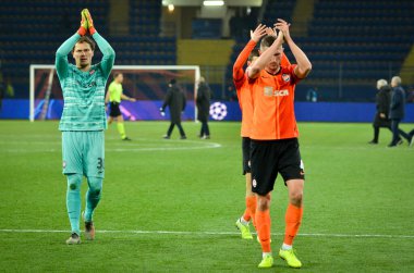 KHARKIV, UKRAINE - December 11, 2019: Shakhtar  player thanks their fans for suppport  during the UEFA Champions League match between Shakhtar vs Atalanta Bergamasca Calcio BC (Italy), Ukraine