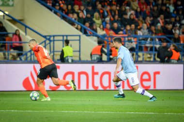 KHARKIV, UKRAINE - September 18, 2019: Ilkay Gundogan and Marlos during the UEFA Champions League match between Shakhtar Donetsk vs Manchester City (England), Ukraine