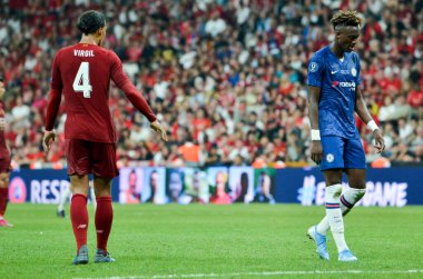 Istanbul, Turkey - August 14, 2019: Virgil van Dijk and Tammy Abraham during the UEFA Super Cup Finals match between Liverpool and Chelsea at Vodafone Park , Turkey