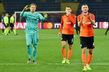 KHARKIV, UKRAINE - December 11, 2019: Shakhtar  player thanks their fans for suppport  during the UEFA Champions League match between Shakhtar vs Atalanta Bergamasca Calcio BC (Italy), Ukraine