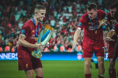 Istanbul, Turkey - August 14, 2019: Jordan Henderson with UEFA Super Cup celebrate victory at award ceremony at Vodafone Park in Vodafone Arena, Turkey
