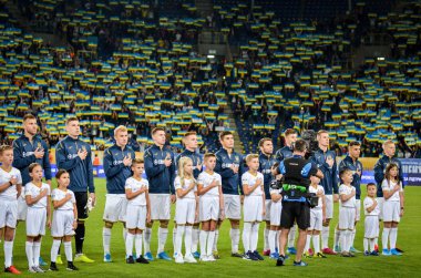 DNIPRO, UKRAINE - September 10, 2019: Ukraine national team during the anthem and friendly match between national team Ukraine against Nigeria national team, Ukraine