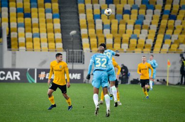 Lviv, Ukrayna - 28 Kasım 2019: Alexandria (Ukrayna) ile Wolfsburg (Almanya), Ukrayna arasındaki Uefa Avrupa Ligi maçı sırasında Marcel Tisserand oyuncusu