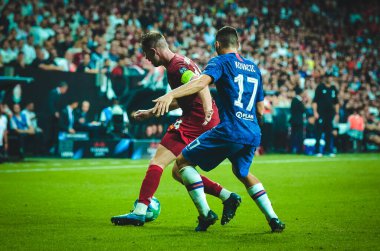 Istanbul, Turkey - August 14, 2019: Jordan Henderson and Mateo Kovacic during the UEFA Super Cup Finals match between Liverpool and Chelsea at Vodafone Park in Vodafone Arena, Turkey
