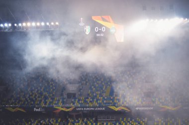 LVIV, UKRAINE - November 07, 2019: Stadium in the fog with a scoreboard during the UEFA Europa League match between Alexandria (Ukraine) vs AS Saint Etienne (France), Ukraine