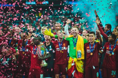 Istanbul, Turkey - August 14, 2019: Liverpool footballers celebrate victory at award ceremony during the UEFA Super Cup Finals match between Liverpool and Chelsea at Vodafone Park, Turkey