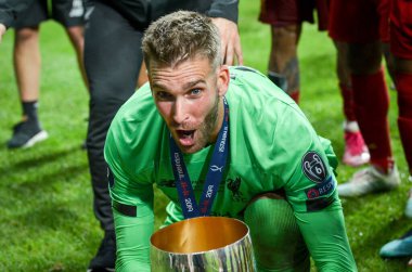 Istanbul, Turkey - August 14, 2019: Adrian celebrate victory and hold trophy UEFA Super Cup at Vodafone Park in Vodafone Arena, Turkey